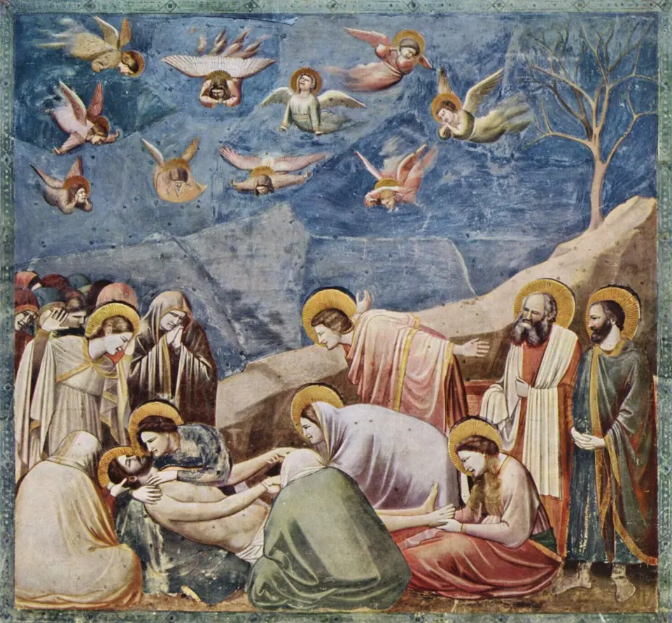 A fresco of mourners grieving over a dead man held on the ground, with angels crying in a blue sky and a rocky ridge sloping down.