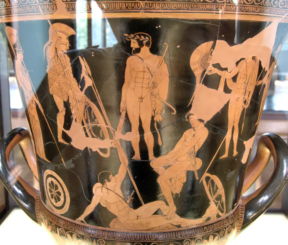 A large two-handled vase with reddish-orange figures on a black background: warriors and a nude hero with a club stand and sit at different heights, as if on a hillside.