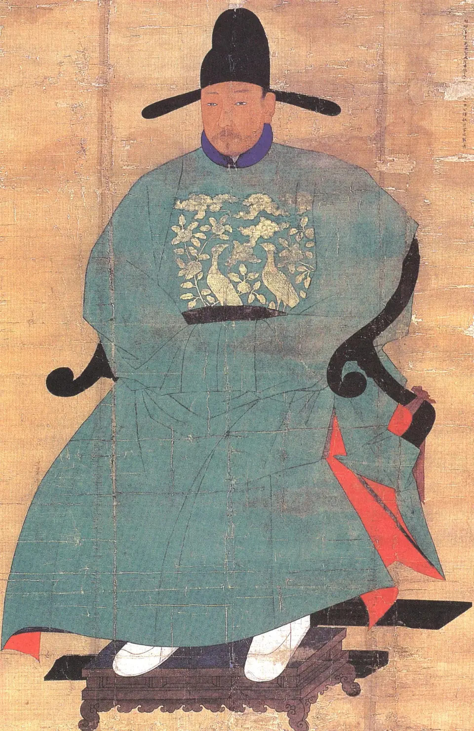 A painted portrait of a seated official in a green robe with an embroidered square on his chest and a black winged hat.